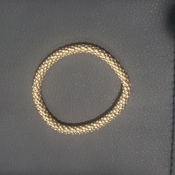 Elastic gold colored fashion bracelet - Picture 1 of 5